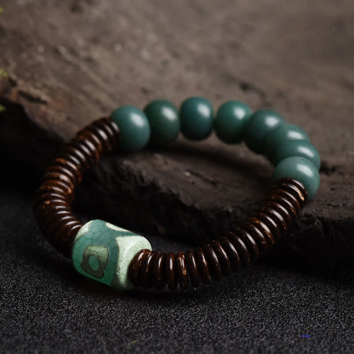 Tibetisches Cyan Bodhi Seed Dzi Perlen-Kokosnussschalen-Armband, das böse Geister fernhält