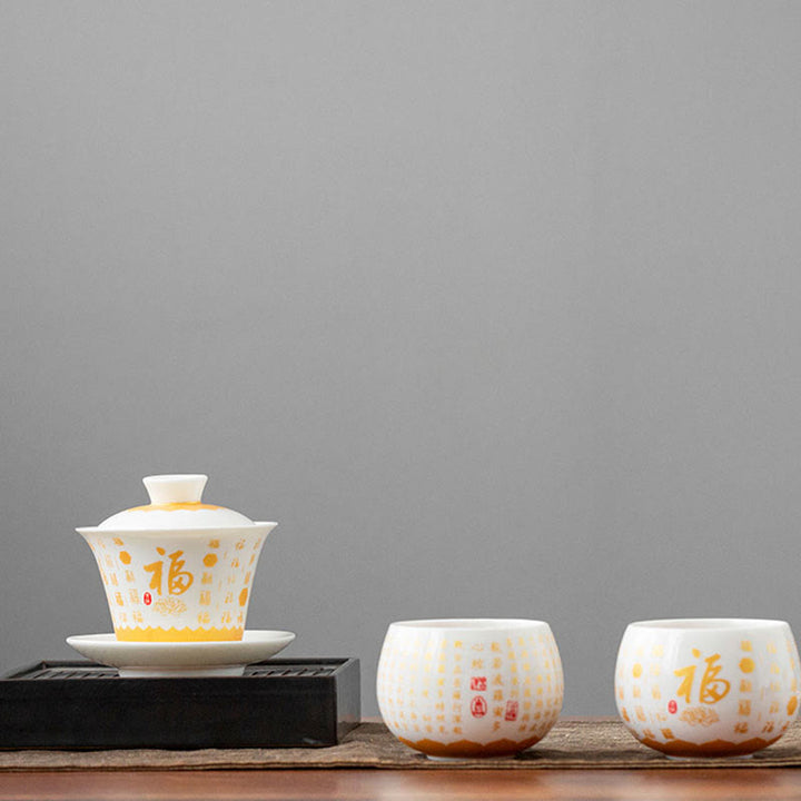 Buddha-Steine, buddhistisches Herz-Sutra, kleine Fu-Figur, Keramik-Gaiwan-Teetasse, Kung-Fu-Teetasse und Untertasse mit Deckel