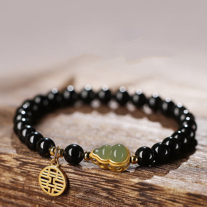 Natürliches schwarzes Obsidian-Hetian-Jade-Kürbis-Armband mit doppelter Glückskraft