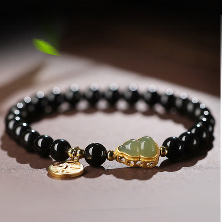 Natürliches schwarzes Obsidian-Hetian-Jade-Kürbis-Armband mit doppelter Glückskraft