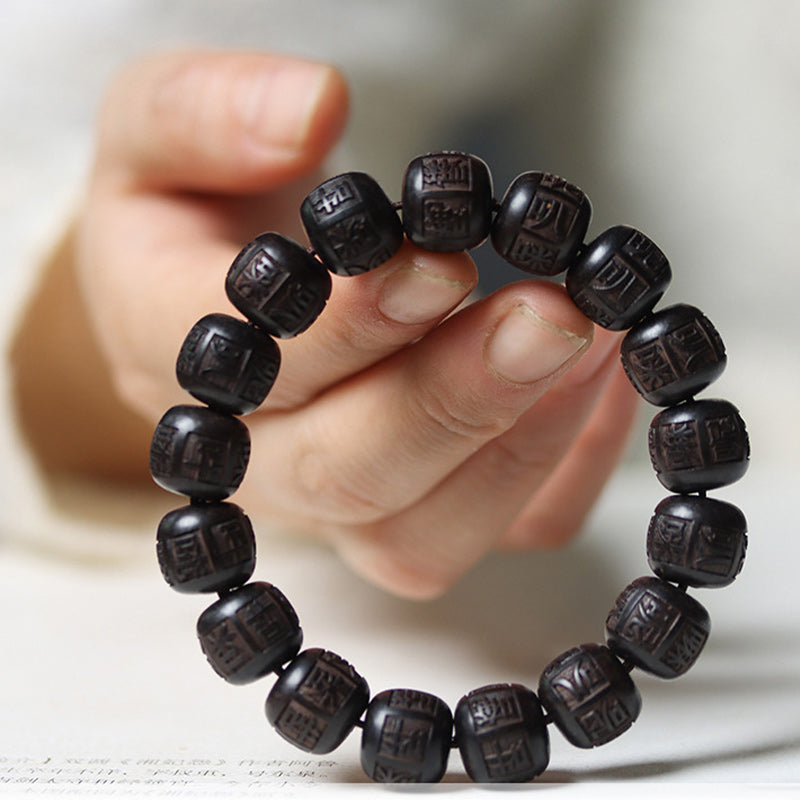 Buddha Stones Balance-Armband aus Tibet-Ebenholz mit Gravur „Om Mani Padme Hum“