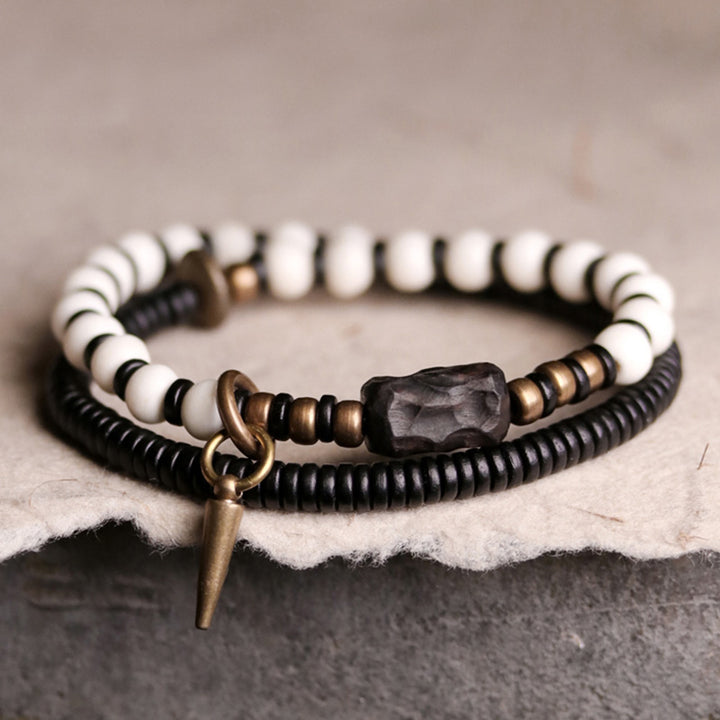 Buddha Stones Knochenperlen Ebenholz Kupfer Stärke Paar Armband