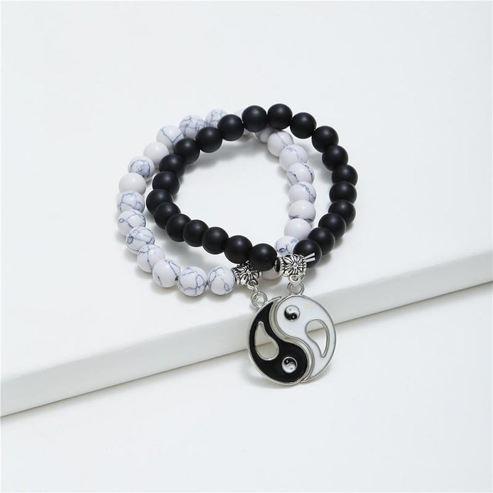 Buddha Stones 2 Stück natürliches schwarzes Onyx- Weiß -Türkis-Perlen-Yin-Yang-Paar-Armband - image 1