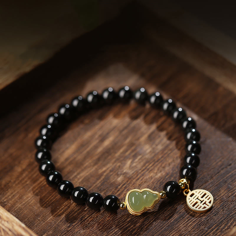 Natürliches schwarzes Obsidian-Hetian-Jade-Kürbis-Armband mit doppelter Glückskraft