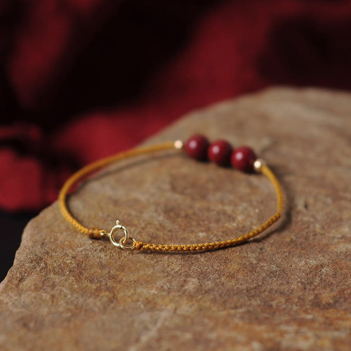 Buddha Stones 14K vergoldetes natürliches Zinnober-Segensband-Geflochtenes Armband