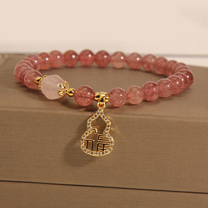 Buddha Stones Armband, Motiv: Erdbeerquarz, Kürbis, Fu, positiver Charm