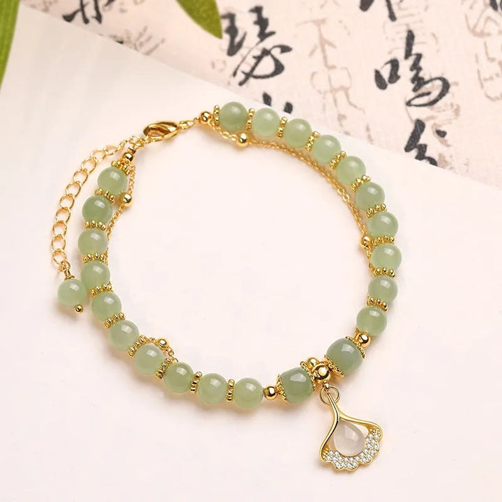 Perlenarmband mit Buddha Stonesn, Jadeblatt, Ginkgo-Tulpe, Erdnuss-Fu-Charakter, Glücksperlen - Ginkgoblatt & Jade - image 11