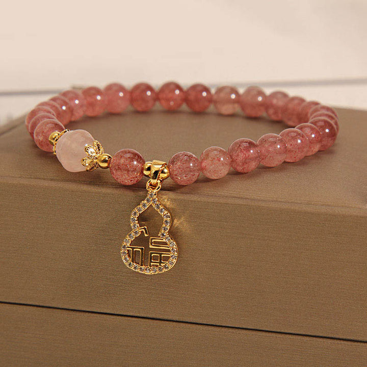 Buddha Stones Armband, Motiv: Erdbeerquarz, Kürbis, Fu, positiver Charm