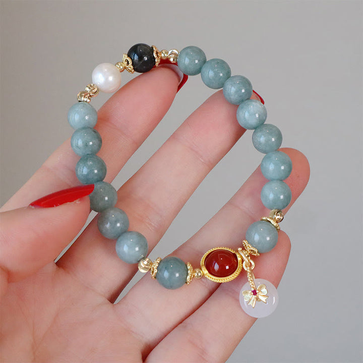 Buddha Stones Armband mit Fliege und Glücksbringer, Naturjade, roter Achat, Perlen