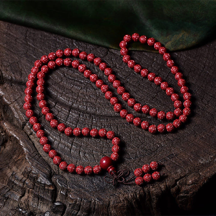 Buddha Stones 108 Mala Perlen Zinnober Om Mani Padme Hum Muster graviertes Segensarmband - image 1