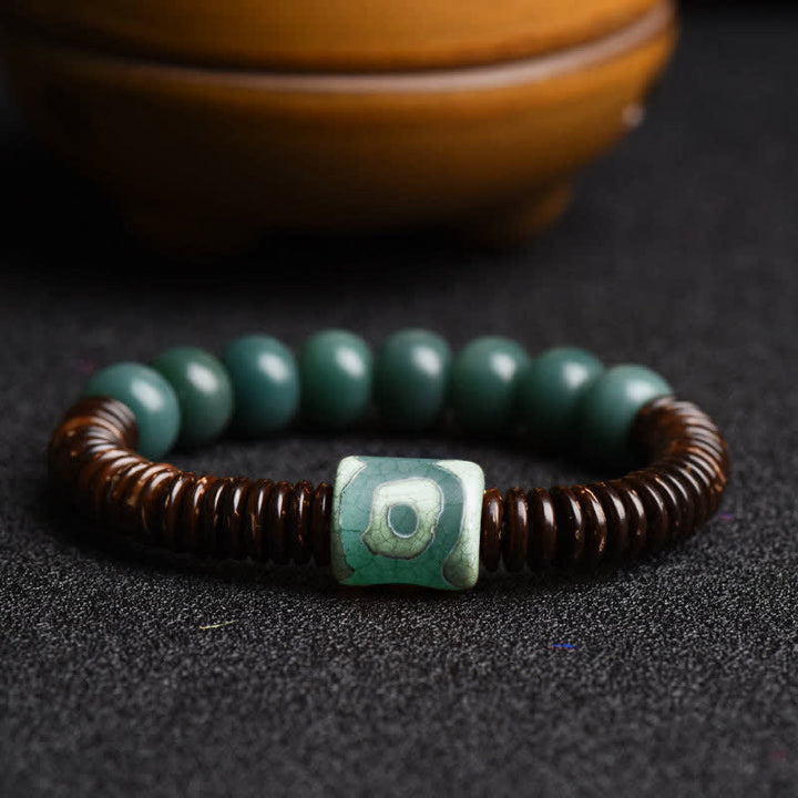 Tibetisches Cyan Bodhi Seed Dzi Perlen-Kokosnussschalen-Armband, das böse Geister fernhält