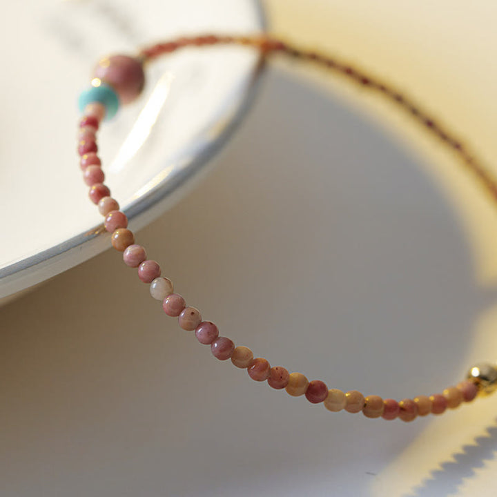 Buddha Stones Armband aus 14-karätig vergoldetem, natürlichem Rhodonit mit Liebesenergie - image 2