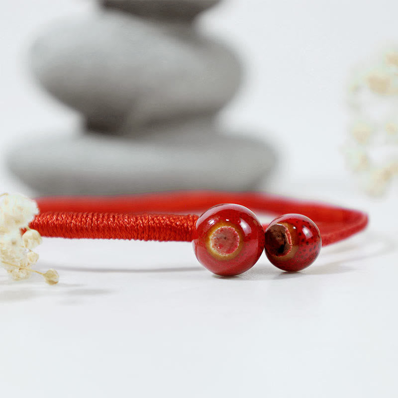 Buddha Stones ​​Feng Shui Glücksarmband aus roter Keramikschnur - image 3