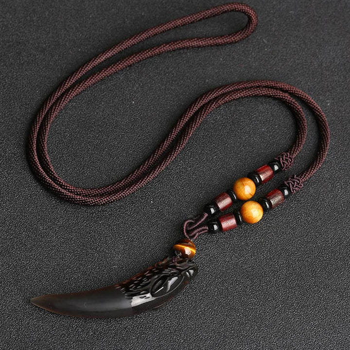 Buddha Stones, natürlicher Eis-Obsidian, Wolfszahn-Muster, Mut-Halsketten-Anhänger - 63 x 14 mm Eisobsidian & braune Schnur - image 3