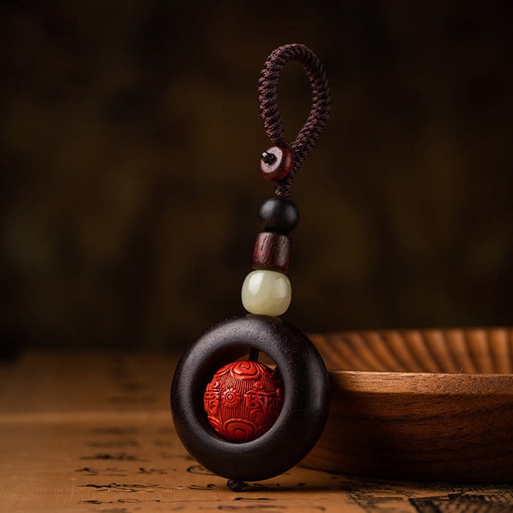 Buddha Stones, Tibet, Om Mani Padme Hum, PiXiu, Kupfermünze, kleines Blatt, rotes Sandelholz, Zinnober, Schutz-Schlüsselanhänger