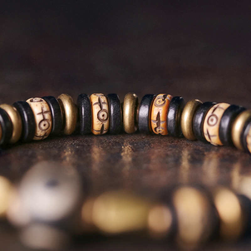 Buddha Stones Tibetische Knochenperlen Ebenholz Kraftarmband
