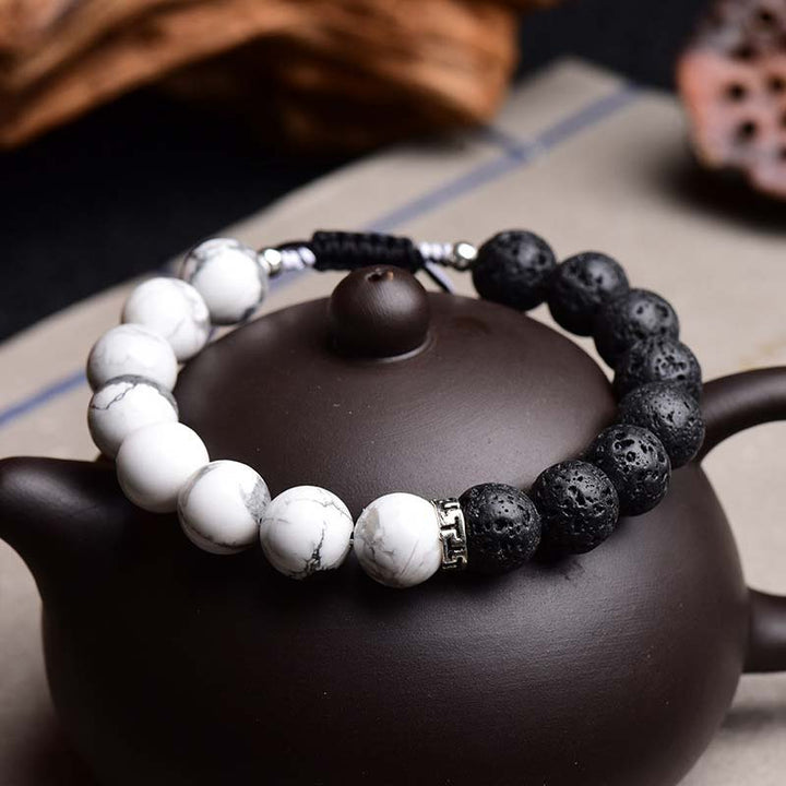 Buddha Stones Yin Yang Lavastein-Schutzarmband - 12 mm - image 0