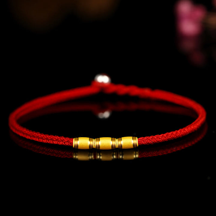 Buddha Stones 999 Gold Glücksperlen-Armband mit acht Fäden, Friedensknoten, rotes Seil