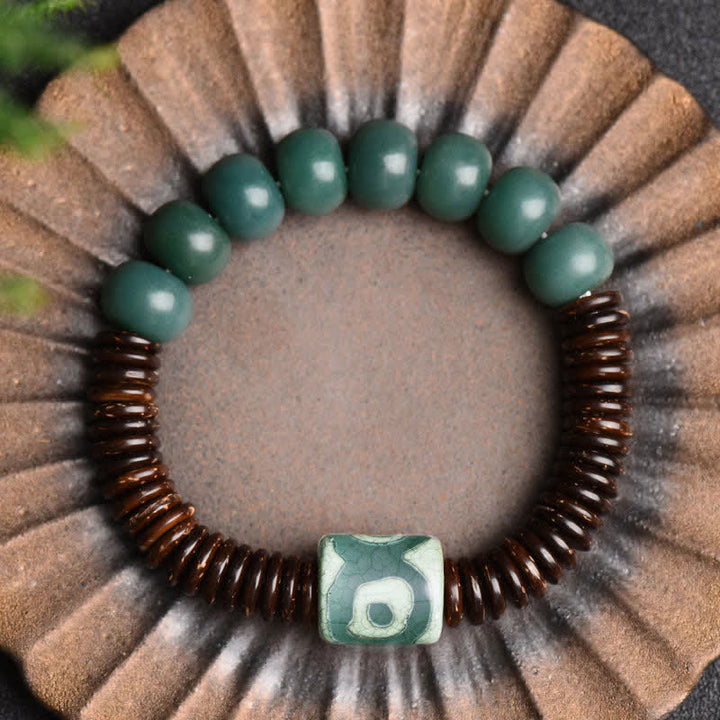 Tibetisches Cyan Bodhi Seed Dzi Perlen-Kokosnussschalen-Armband, das böse Geister fernhält