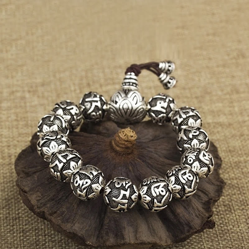 Buddha Stones Tibetisches Om Mani Padme Hum Amulett-Armband mit geschnitzten Legierungsperlen