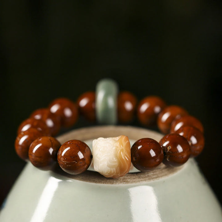 Armband mit Buddha Stonesn, lila Bodhi-Samen, tanzender Löwe, Weisheit