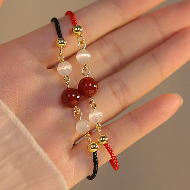 Buddha Stones Rotes Achat-Katzenaugen-Armband mit geflochtener Schnur