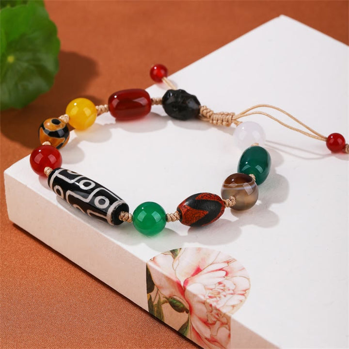 Buddha Stones Tibetisches Neun-Augen-Dzi-Perlen-Achat-Wohlstandsschutz-Armband