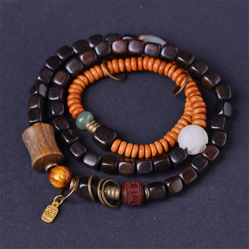 Buddha Stones, grünes Sandelholz, Ebenholz, Om Mani Padme Hum, graviertes Friedens-Dreifach-Wickelarmband