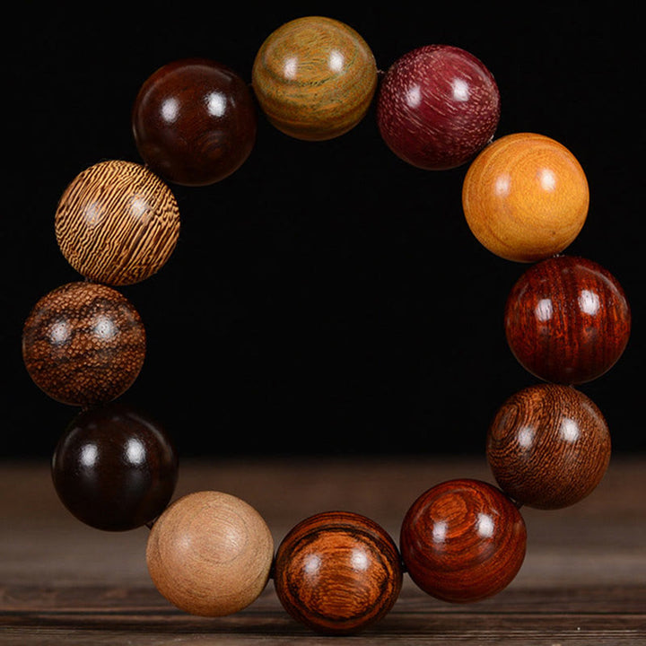 Buddha Stones Mehrfarbiges Sandelholz-Schutz-Heilarmband