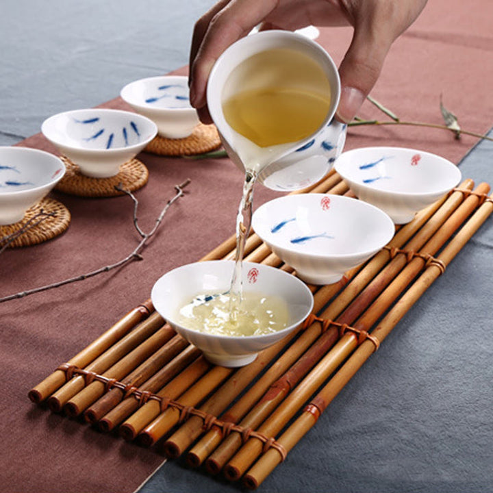 Buddha Stones Jingdezhen blaue und Weiß Porzellan-Koi-Fisch-Teetasse aus Keramik, Kung-Fu-Teetassen