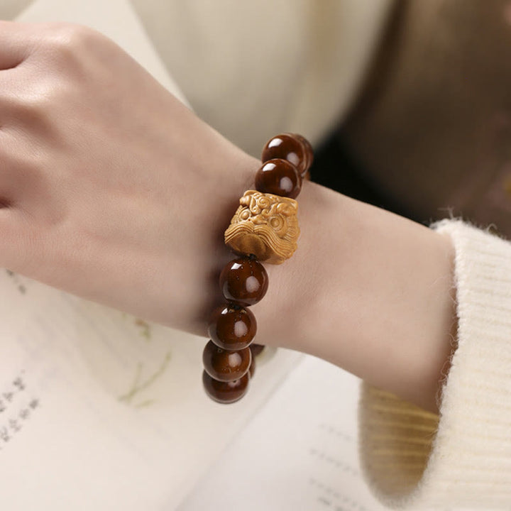 Armband mit Buddha Stonesn, lila Bodhi-Samen, tanzender Löwe, Weisheit