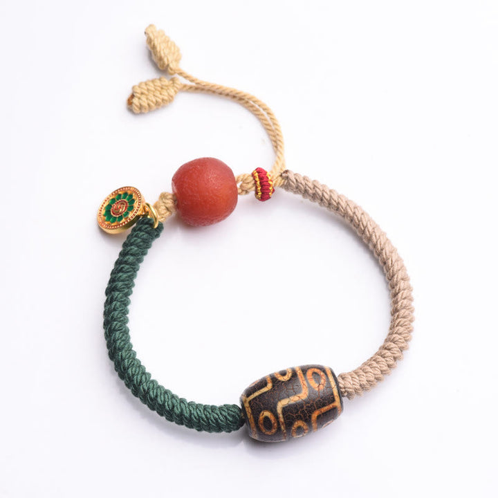 Buddha Stones Handgefertigtes tibetisches Neun-Augen-Dzi-Perlen-Armband