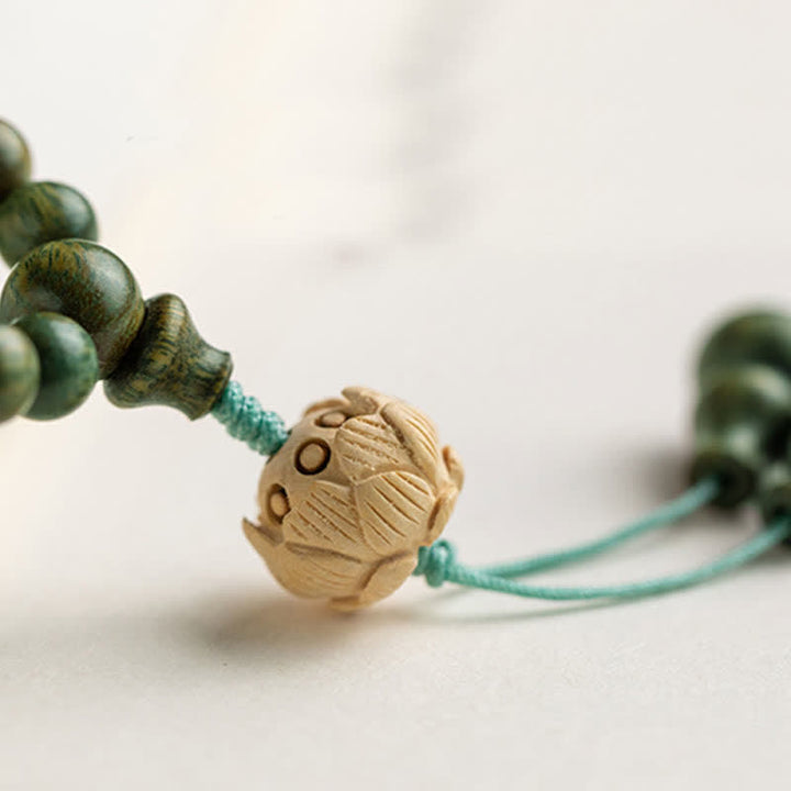 Buddha Stones 108 Mala-Perlen, grünes Sandelholz, Buchsbaum, Lotus, positives Armband