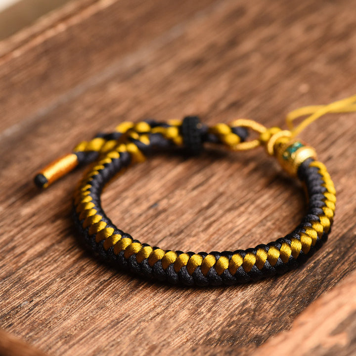 Buddha Stones Handgefertigtes tibetisches Armband mit Drachenschuppen-Seil, Om Mani Padme Hum, Reinheit aus tibetischem Schwarzgold