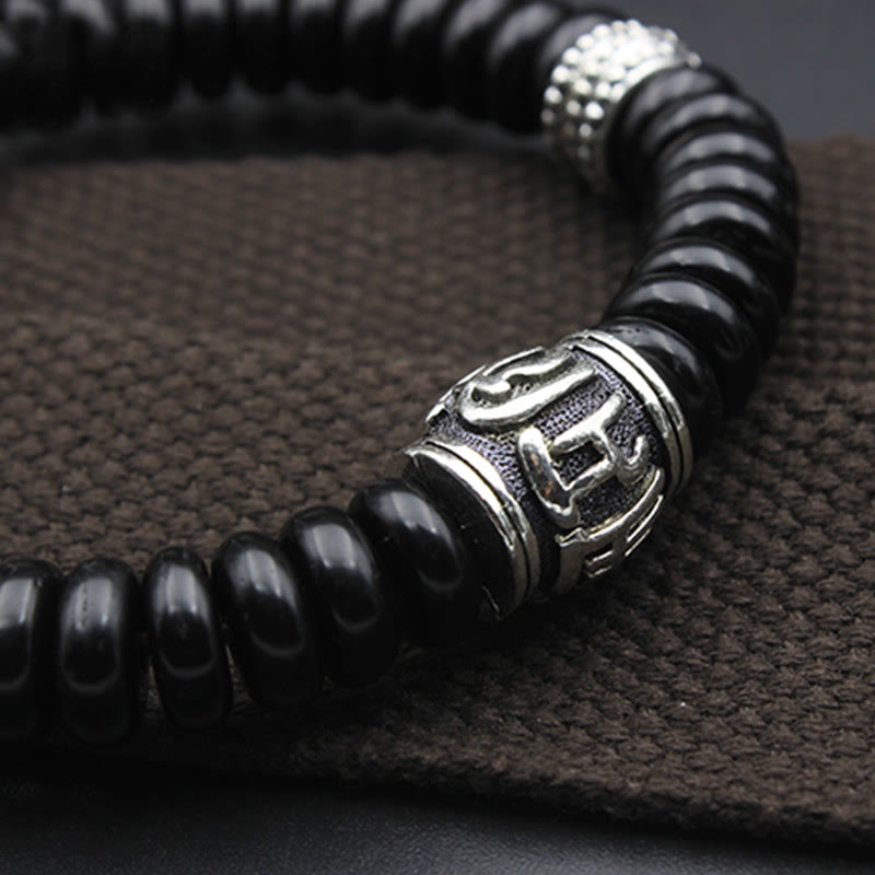 Buddha Stones Natürliches tibetisches Om Mani Padme Hum Positive Armband aus Kokosnussschale