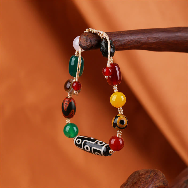 Buddha Stones Tibetisches Neun-Augen-Dzi-Perlen-Achat-Wohlstandsschutz-Armband