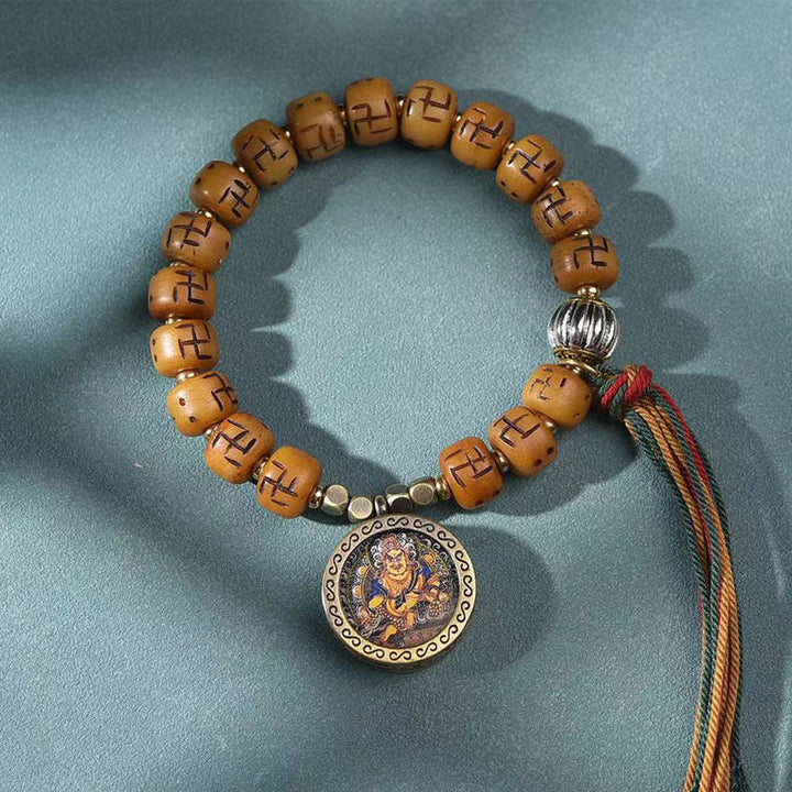 Buddha Stones, natürliches tibetisches Kamelknochen-Hakenkreuz-Dzi-Perle, Shankha-Buddha-Charm, Kirtimukha-Glücksschutz-Quastenarmband