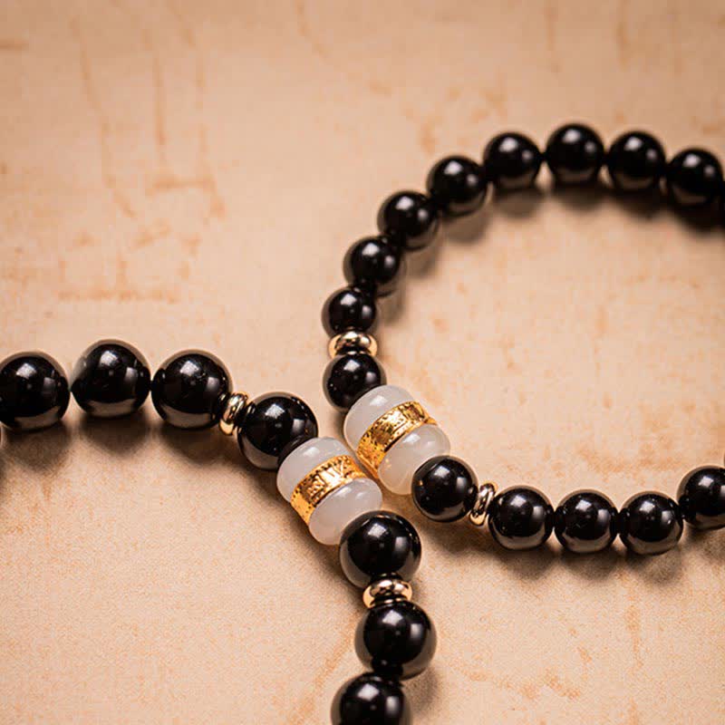 Buddha Stones Schwarzer Obsidian Jade Om Mani Padme Hum Stärke Paar Magnetarmband