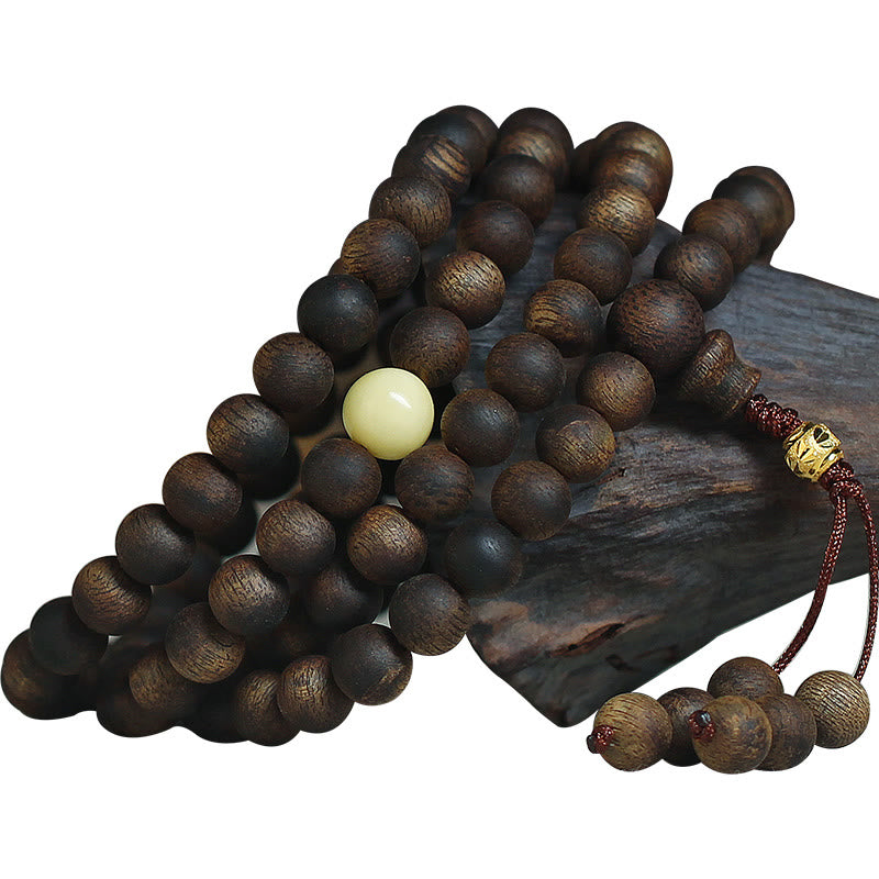 Buddha Stones 999 Gold Tarakan 108 Mala Perlen Adlerholz Bernstein Armband zur Abwehr böser Geister