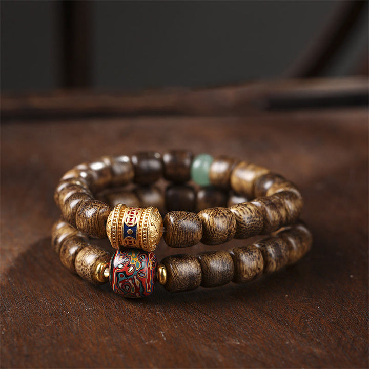 Armband mit Buddha Stonesn, Agarholz, Kupfermünze, verheißungsvolle Wolke, Ruhe