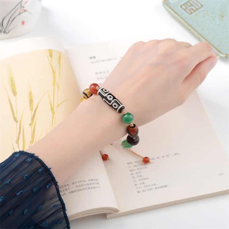 Buddha Stones Tibetisches Neun-Augen-Dzi-Perlen-Achat-Wohlstandsschutz-Armband