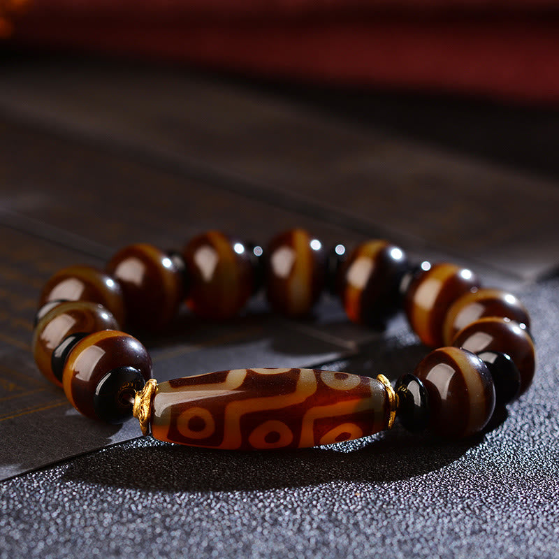 Buddha Stones Tibetisches natürliches Neun-Augen-Dzi-Perlen-Achat-Armband für Reichtum und Segen