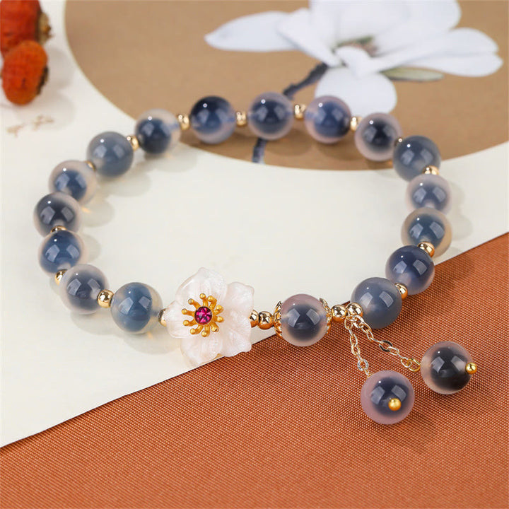 Buddha Stones natürliches blaues Bonbon-Achat-Kirschblüten-Armband mit heilender Stärke