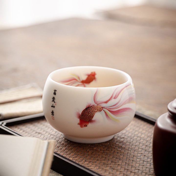 Buddha Stones Koi Fisch Weiß Porzellan-Keramik-Teetasse Kung-Fu-Teetasse