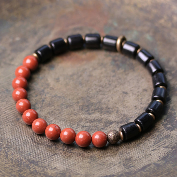 Armband mit Buddha Stonesn, Ebenholz, rotem Jaspis, Moos-Achat, Kristall, Kupfer, Friedenspaar