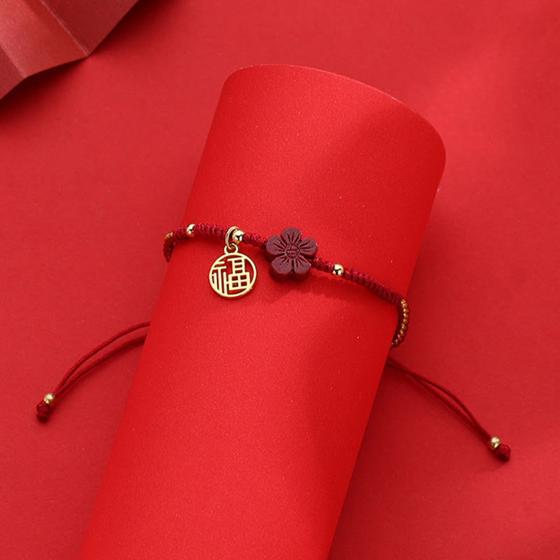 Buddha Stones Cinnabar Flower Fu Charakter Segen geflochtenes Schnurarmband