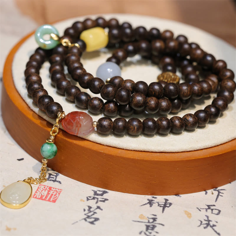 Buddha Stones 108 Mala Perlen Brunei Agarwood Bernstein Roter Achat Friedensschnalle Jade Friedensarmband