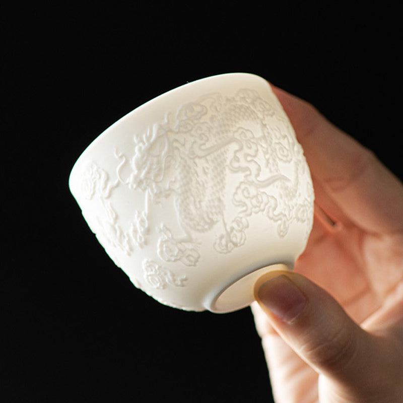 Buddha Stones Dragon Phoenix Relief Weiß Porzellan-Keramik-Teetasse Kung-Fu-Teetasse 115 ml