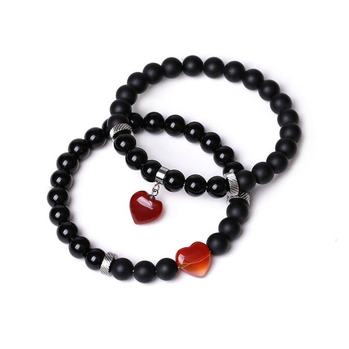 Buddha Stones 2-teiliges schwarzes Onyx-Kristall-Stein-Liebes-Herz-Schutz-Unterstützungs-Paar-Armband