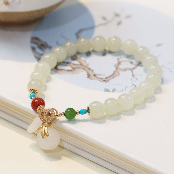 Buddha Stones Armband aus natürlicher Hetian- Weiß Jade, 14 Karat vergoldet, Geldbeutel-Segensarmband